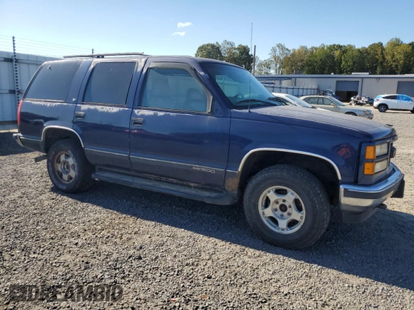 1999 GMC Yukon with VIN 1GKEK13R3XJ757466, listed as a Copart auction lot 75750884 with 270,768 mi miles and Salvage Title. Bid and sale history available at carsss.com. Image 4.