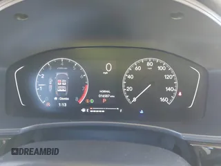2022 Honda Civic Sport z VIN 2HGFE2F50NH601567, wystawiony jako IAAI lot #40880687 z przebiegiem 16 587 mil mil oraz . Historia ofert i sprzedaży dostępna na DreamBid. Obrazek 7.