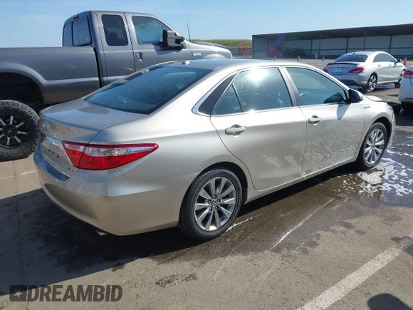 2015 Toyota Camry LE z VIN 4T1BD1FK1FU174975, wystawiony jako IAAI lot #42085034 z przebiegiem 54 728 mil mil oraz . Historia ofert i sprzedaży dostępna na DreamBid. Obrazek 4.