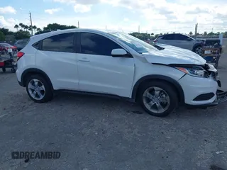 2021 Honda HR-V LX with VIN 3CZRU5H34MM726044, listed as a IAAI auction lot 41230932 with 39,134 mi miles. Bid and sale history available at carsss.com. Image 1.