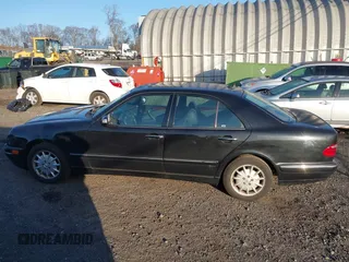 2000 Mercedes-Benz E-Class with VIN WDBJF65J1YB058351, listed as a IAAI auction lot 41834603 with 100,525 mi miles. Bid and sale history available at carsss.com. Image 14.