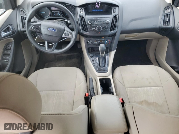 2018 Ford Focus SE z VIN 1FADP3F27JL250591, wystawiony jako Copart lot #54989245 z przebiegiem 85 838 mil mil oraz Szkoda całkowita • Salvage title. Historia ofert i sprzedaży dostępna na DreamBid. Obrazek 8.