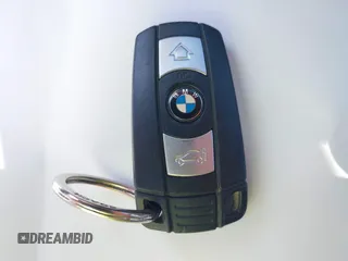 2012 BMW 3 Series 335i with VIN WBAKG7C53CE803345, listed as a IAAI auction lot 42489548 with 96,521 mi miles and . Bid and sale history available at DreamBid. Image 11.