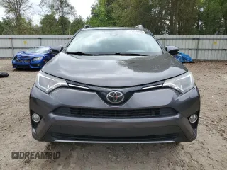 2018 Toyota RAV4 XLE with VIN 2T3WFREV6JW409330, listed as a Copart auction lot 51284165 with 83,689 mi miles and Salvage Title. Bid and sale history available at DreamBid. Image 5.