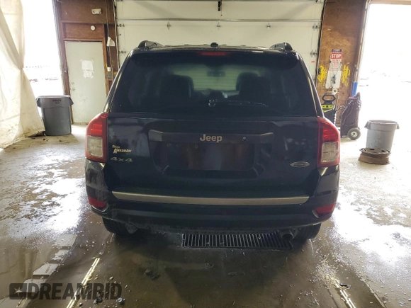 2016 Jeep Compass Sport with VIN 1C4NJDBBXGD598240, listed as a Copart auction lot 57887495 with 152,932 mi miles and Salvage title. Bid and sale history available at DreamBid. Image 6.