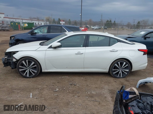 2019 Nissan Altima 2.5 Platinum with VIN 1N4BL4FV9KC112037, listed as a IAAI auction lot 41912037 with 88,484 mi miles. Bid and sale history available at carsss.com. Image 15.