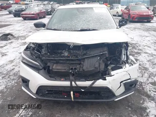 2023 Honda Civic Sport z VIN 19XFL2H89PE008381, wystawiony jako IAAI lot #41443683 z przebiegiem Nie podano mil oraz . Historia ofert i sprzedaży dostępna na DreamBid. Obrazek 6.