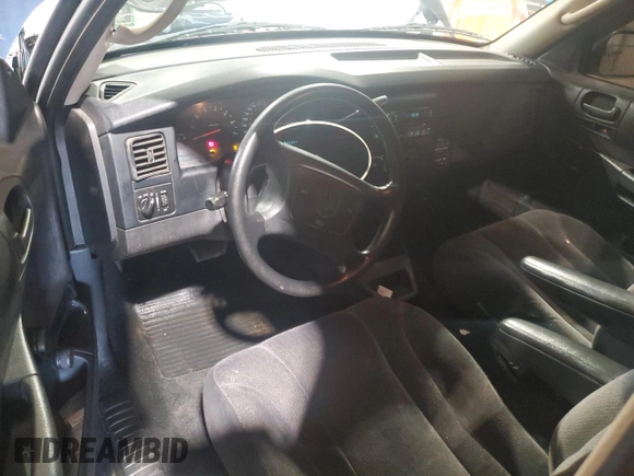 2004 Dodge Dakota z VIN 1D7GG16KX4S586053, wystawiony jako Copart lot #60221585 z przebiegiem 150 150 mil mil oraz Szkoda całkowita • Salvage title. Historia ofert i sprzedaży dostępna na DreamBid. Obrazek 8.