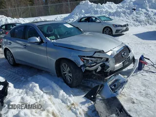 2015 Infiniti Q50 Premium z VIN JN1BV7ARXFM395132, wystawiony jako IAAI lot #41618895 z przebiegiem 96 951 mil mil oraz . Historia ofert i sprzedaży dostępna na DreamBid. Obrazek 1.