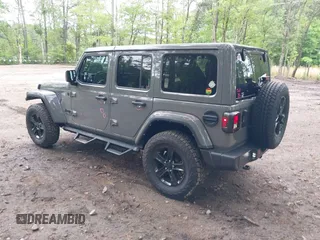 2021 Jeep Wrangler Unlimited Sahara with VIN 1C4HJXEG0MW703812, listed as a IAAI auction lot 42186089 with 50,349 mi miles and . Bid and sale history available at DreamBid. Image 3.