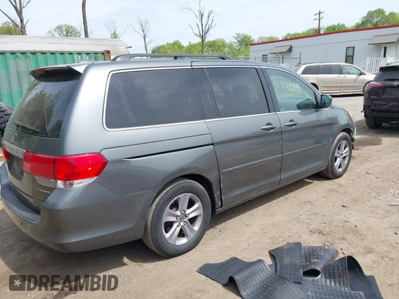 2008 Honda Odyssey Touring with VIN 5FNRL38908B100051, listed as a IAAI auction lot 42110484 with 190,567 mi miles and . Bid and sale history available at DreamBid. Image 4.