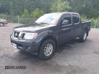 2015 Nissan Frontier SV with VIN 1N6AD0EV6FN751948, listed as a IAAI auction lot 42063935 with 52,244 mi miles and . Bid and sale history available at DreamBid. Image 2.