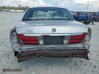 2005 Mercury Grand Marquis LS Premium with VIN 2MEHM75W75X657043, listed as a Copart auction lot 71648694 with 143,672 mi miles and Salvage Title. Bid and sale history available at carsss.com. Image 6.