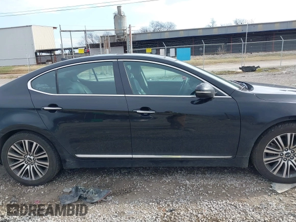 2015 Kia Cadenza Premium with VIN KNALN4D74F5188219, listed as a IAAI auction lot 41530800 with 144,330 mi miles. Bid and sale history available at carsss.com. Image 13.