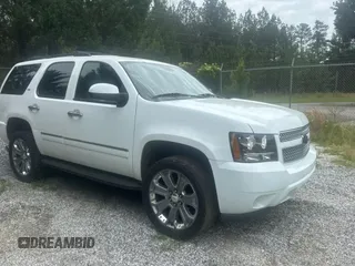 2009 Chevrolet Tahoe LTZ with VIN 1GNFK330X9J100915, listed as a Copart auction lot 55279675 with 254,708 mi miles and Salvage title. Bid and sale history available at DreamBid. Image 1.