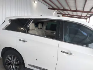 2013 Infiniti JX35 with VIN 5N1AL0MM4DC342673, listed as a IAAI auction lot 41813025 with 125,982 mi miles and . Bid and sale history available at DreamBid. Image 6.