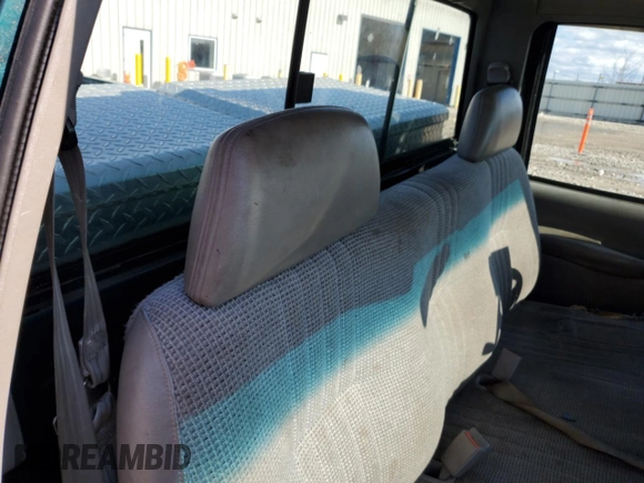 1997 GMC Sierra 1500 SL with VIN 1GTEC14WXVZ505001, listed as a Copart auction lot 53973435 with 217,305 mi miles and Non Repairable. Bid and sale history available at DreamBid. Image 10.