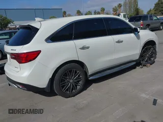 2016 Acura MDX w/Tech with VIN 5FRYD4H47GB045999, listed as a IAAI auction lot 42041010 with 124,096 mi miles. Bid and sale history available at carsss.com. Image 4.