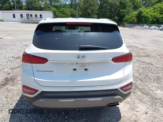 2019 Hyundai Santa Fe SE with VIN 5NMS23AD0KH013811, listed as a IAAI auction lot 42337926 with 87,000 mi miles and . Bid and sale history available at DreamBid. Image 16.