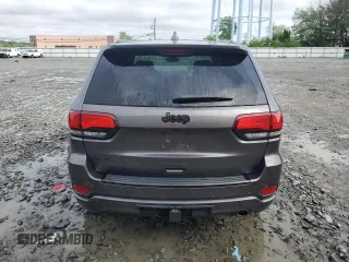 2017 Jeep Grand Cherokee Altitude z VIN 1C4RJFAG9HC720250, wystawiony jako Copart lot #56956155 z przebiegiem 138 879 mil mil oraz Szkoda całkowita • Salvage title. Historia ofert i sprzedaży dostępna na DreamBid. Obrazek 6.
