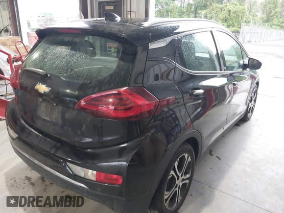 2019 Chevrolet Bolt EV Premier with VIN 1G1FZ6S09K4106306, listed as a IAAI auction lot 41947642 with 90,952 mi miles and . Bid and sale history available at DreamBid. Image 4.