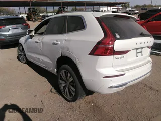 2022 Volvo XC60 Recharge Plug-In Hybrid Inscription with VIN YV4BR0DL8N1977341, listed as a IAAI auction lot 34114187 with 10,593 mi miles. Bid and sale history available at carsss.com. Image 3.