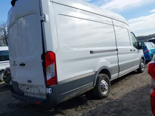 2023 Ford Transit Cargo with VIN 1FTBR3U88PKB01785, listed as a IAAI auction lot 41681093 with 47,672 mi miles and . Bid and sale history available at DreamBid. Image 4.