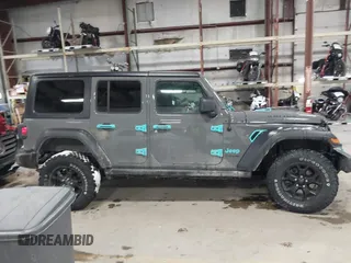 2021 Jeep Wrangler Unlimited Sport S with VIN 1C4HJXDN9MW819753, listed as a IAAI auction lot 41415569 with 43,263 mi miles and . Bid and sale history available at DreamBid. Image 13.