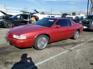 1999 Cadillac Eldorado Touring with VIN 1G6ET1293XU611368, listed as a Copart auction lot 82683114 with 126,178 mi miles and Salvage Title. Bid and sale history available at DreamBid. Image 1.