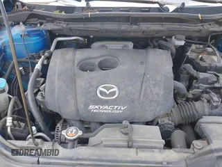 2014 Mazda CX-5 Sport z VIN JM3KE4BE4E0367444, wystawiony jako IAAI lot #42431272 z przebiegiem 181 191 mil mil oraz . Historia ofert i sprzedaży dostępna na DreamBid. Obrazek 10.