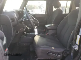 2018 Jeep Wrangler JK Unlimited Sport S with VIN 1C4BJWDG1JL907310, listed as a Copart auction lot 70826504 with 135,413 mi miles and Salvage Title. Bid and sale history available at carsss.com. Image 7.