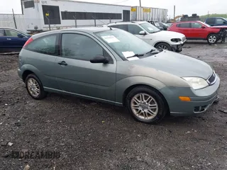 2005 Ford Focus with VIN 3FAHP31N15R140825, listed as a IAAI auction lot 42244132 with 62,972 mi miles and . Bid and sale history available at DreamBid. Image 1.