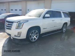2015 Cadillac Escalade ESV Premium z VIN 1GYS4TKJ9FR700022, wystawiony jako IAAI lot #41748188 z przebiegiem 166 416 mil mil oraz . Historia ofert i sprzedaży dostępna na DreamBid. Obrazek 17.