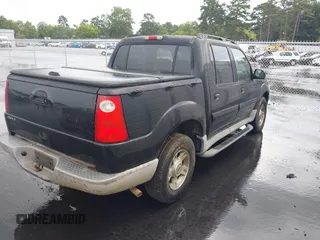 2003 Ford Explorer Sport Trac XLS z VIN 1FMZU67E73UC26464, wystawiony jako IAAI lot #42802849 z przebiegiem 228 139 mil mil oraz . Historia ofert i sprzedaży dostępna na DreamBid. Obrazek 4.