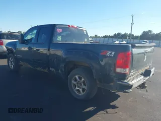 2009 GMC Sierra 1500 SLE with VIN 1GTEK29059Z292915, listed as a IAAI auction lot 40400096 with 180,439 mi miles. Bid and sale history available at carsss.com. Image 3.