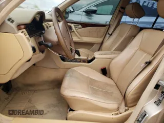 2002 Mercedes-Benz E-Class with VIN WDBJF65J12B463150, listed as a Copart auction lot 74434654 with 215,883 mi miles and Salvage Title. Bid and sale history available at carsss.com. Image 7.