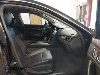 2014 Cadillac CTS Luxury AWD with VIN 1G6AX5S36E0173682, listed as a IAAI auction lot 41538709 with 102,772 mi miles and . Bid and sale history available at DreamBid. Image 5.