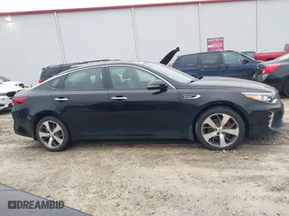 2017 Kia Optima SX with VIN 5XXGW4L21HG145463, listed as a IAAI auction lot 41604494 with 160,228 mi miles. Bid and sale history available at carsss.com. Image 13.
