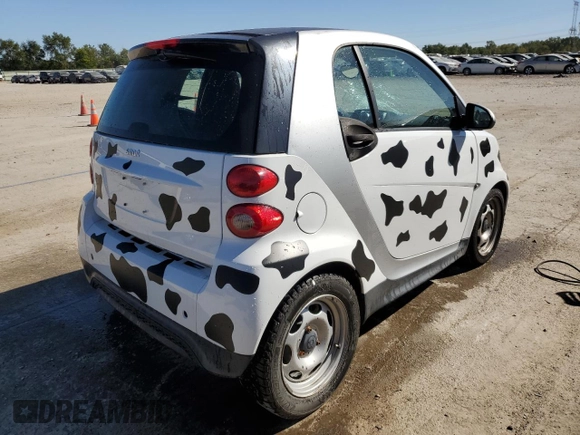 2013 Smart fortwo Pure z VIN WMEEJ3BA5DK694853, wystawiony jako Copart lot #74003734 z przebiegiem 27 720 mil mil oraz Szkoda całkowita • Salvage title. Historia ofert i sprzedaży dostępna na DreamBid. Obrazek 3.