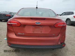 2018 Ford Focus SE with VIN 1FADP3F21JL316763, listed as a Copart auction lot 50241445 with 104,830 mi miles and Salvage Title. Bid and sale history available at carsss.com. Image 6.