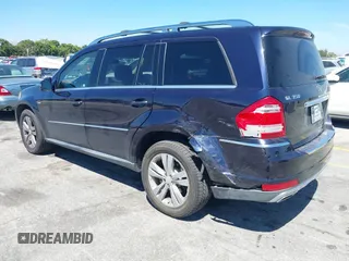 2012 Mercedes-Benz GL 350 with VIN 4JGBF2FEXCA776247, listed as a IAAI auction lot 41837519 with 119,421 mi miles and . Bid and sale history available at DreamBid. Image 3.