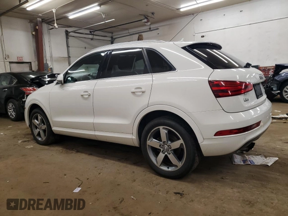 2015 Audi Q3 Premium Plus with VIN WA1EFCFS9FR006974, listed as a Copart auction lot 60036635 with 117,961 mi miles and Clean title. Bid and sale history available at DreamBid. Image 2.