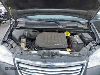 2015 Chrysler Town & Country Touring-L with VIN 2C4RC1CG9FR674238, listed as a IAAI auction lot 41908335 with 138,819 mi miles. Bid and sale history available at carsss.com. Image 10.