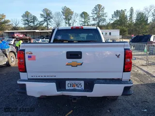 2018 Chevrolet Silverado 1500 Custom with VIN 1GCRCPEC0JZ358528, listed as a IAAI auction lot 41441578 with 113,078 mi miles. Bid and sale history available at carsss.com. Image 16.