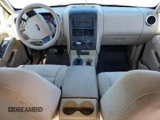 2007 Ford Explorer Sport Trac XLT with VIN 1FMEU51887UA09474, listed as a Copart auction lot 57625115 with 128,443 mi miles and Salvage title. Bid and sale history available at DreamBid. Image 8.