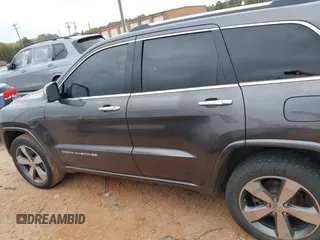 2014 Jeep Grand Cherokee Overland с VIN 1C4RJFCG6EC570431, выставлен на аукционе IAAI как лот 41935177 с пробегом 182 905 миль миль и . История ставок и продаж доступна на DreamBid. Изображение 14.