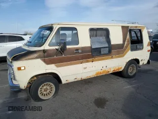 1979 GMC Vandura z VIN TGR2597506100, wystawiony jako Copart lot #51086615 z przebiegiem 25 002 mil mil oraz Tytuł czysty. Historia ofert i sprzedaży dostępna na DreamBid. Obrazek 1.