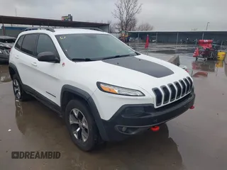 2015 Jeep Cherokee Trailhawk with VIN 1C4PJMBB1FW630519, listed as a IAAI auction lot 41605466 with 219,390 mi miles and . Bid and sale history available at carsss.com. Image 1.