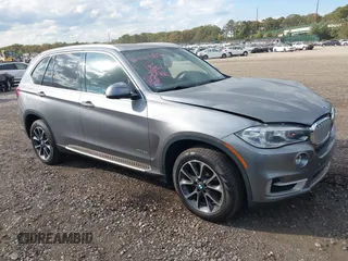 2014 BMW X5 xDrive35i with VIN 5UXKR0C52E0K50710, listed as a IAAI auction lot 40529606 with 114,307 mi miles. Bid and sale history available at carsss.com. Image 1.