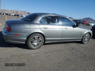 2003 Jaguar S-Type z VIN SAJEA01U03HM57757, wystawiony jako Copart lot #73440434 z przebiegiem 188 389 mil mil oraz Szkoda całkowita • Salvage title. Historia ofert i sprzedaży dostępna na DreamBid. Obrazek 3.